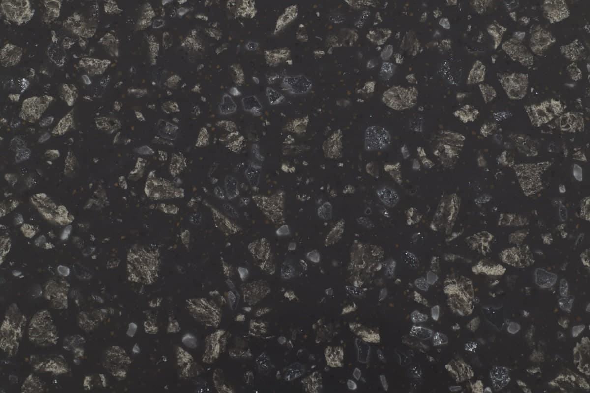 Stratum recycled glass worktop finish, a grey speckled surface