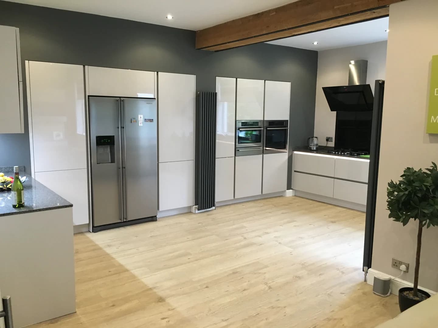 Completed kitchen showing our Vivo Gloass range with white finish