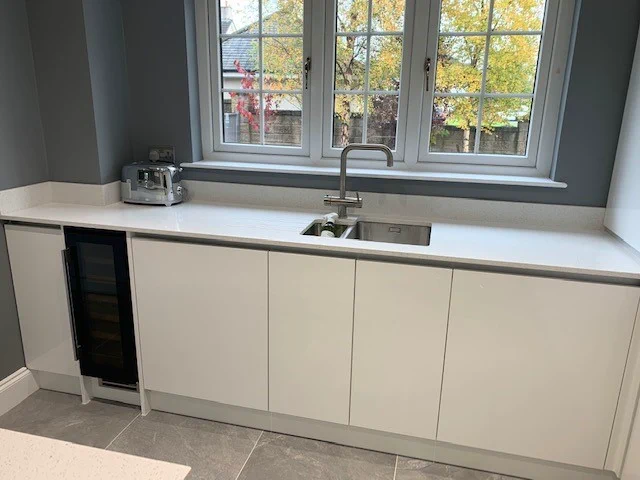 Completed kitchen showing our Vivo Gloass range with white finish