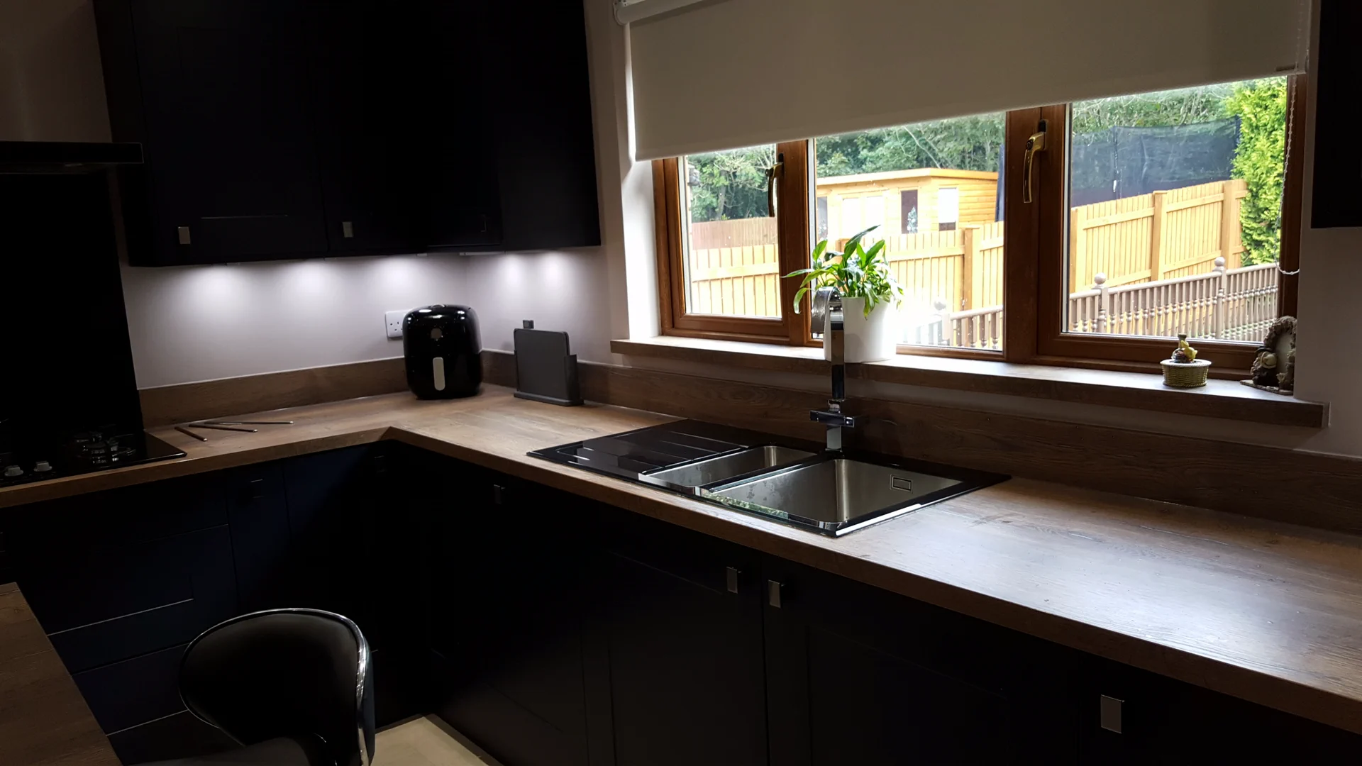 Completed kitchen showing our Vivo Gloass range with white finish