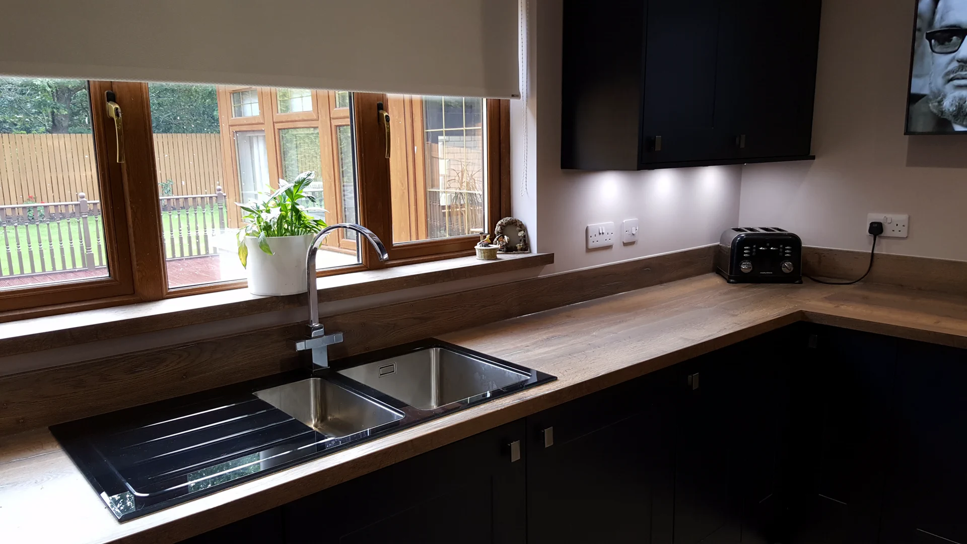 Completed kitchen showing our Vivo Gloass range with white finish