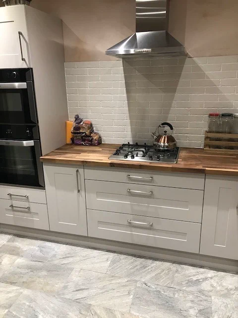 Completed kitchen showing our Rydal range with cashmere finish