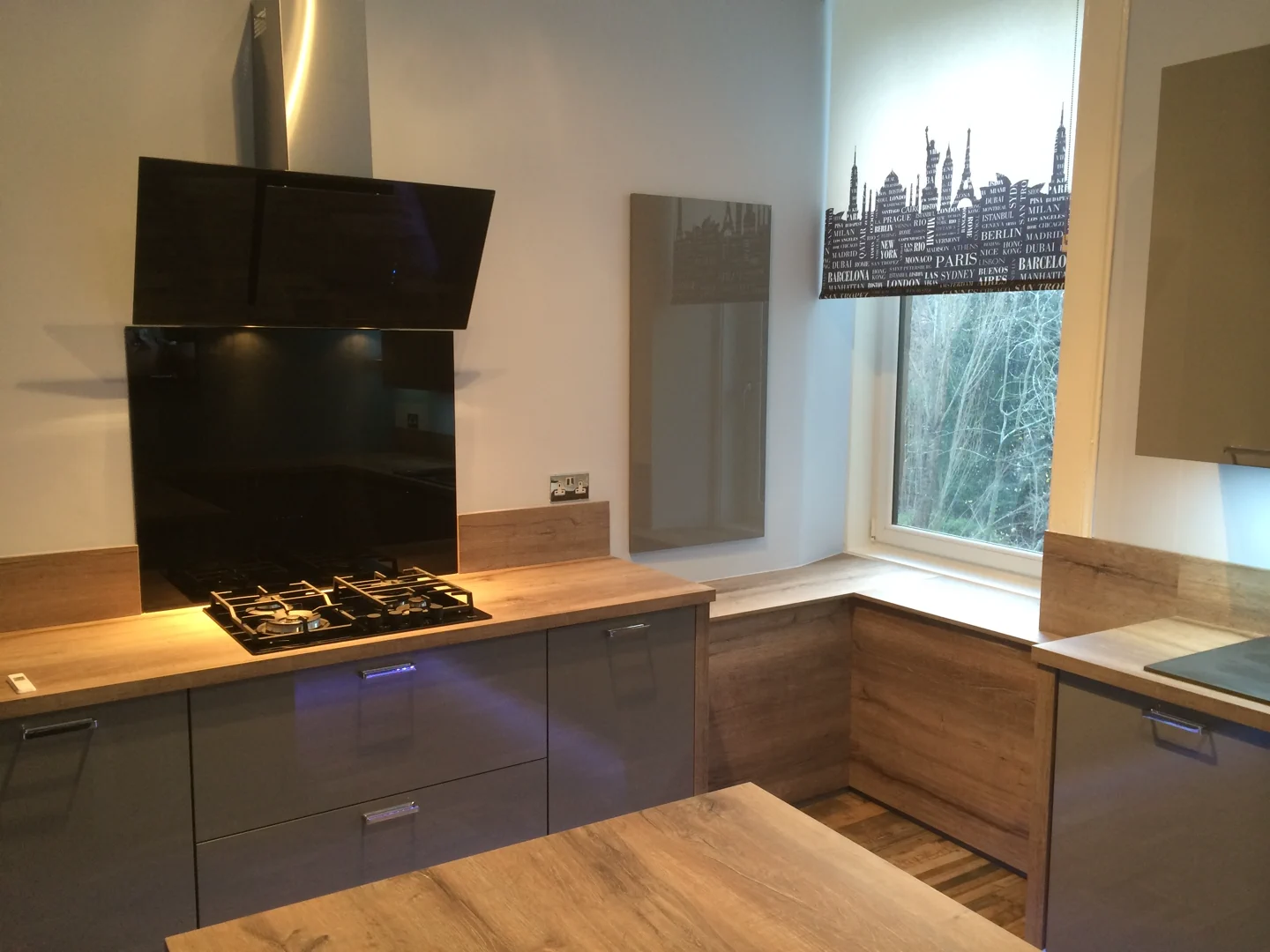 Completed kitchen showing our Vivo Gloass range with grey finish