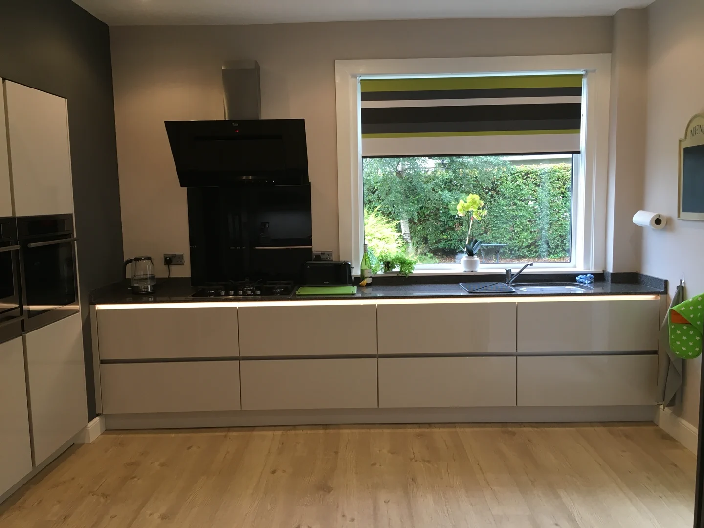Completed kitchen showing our Vivo Gloass range with white finish