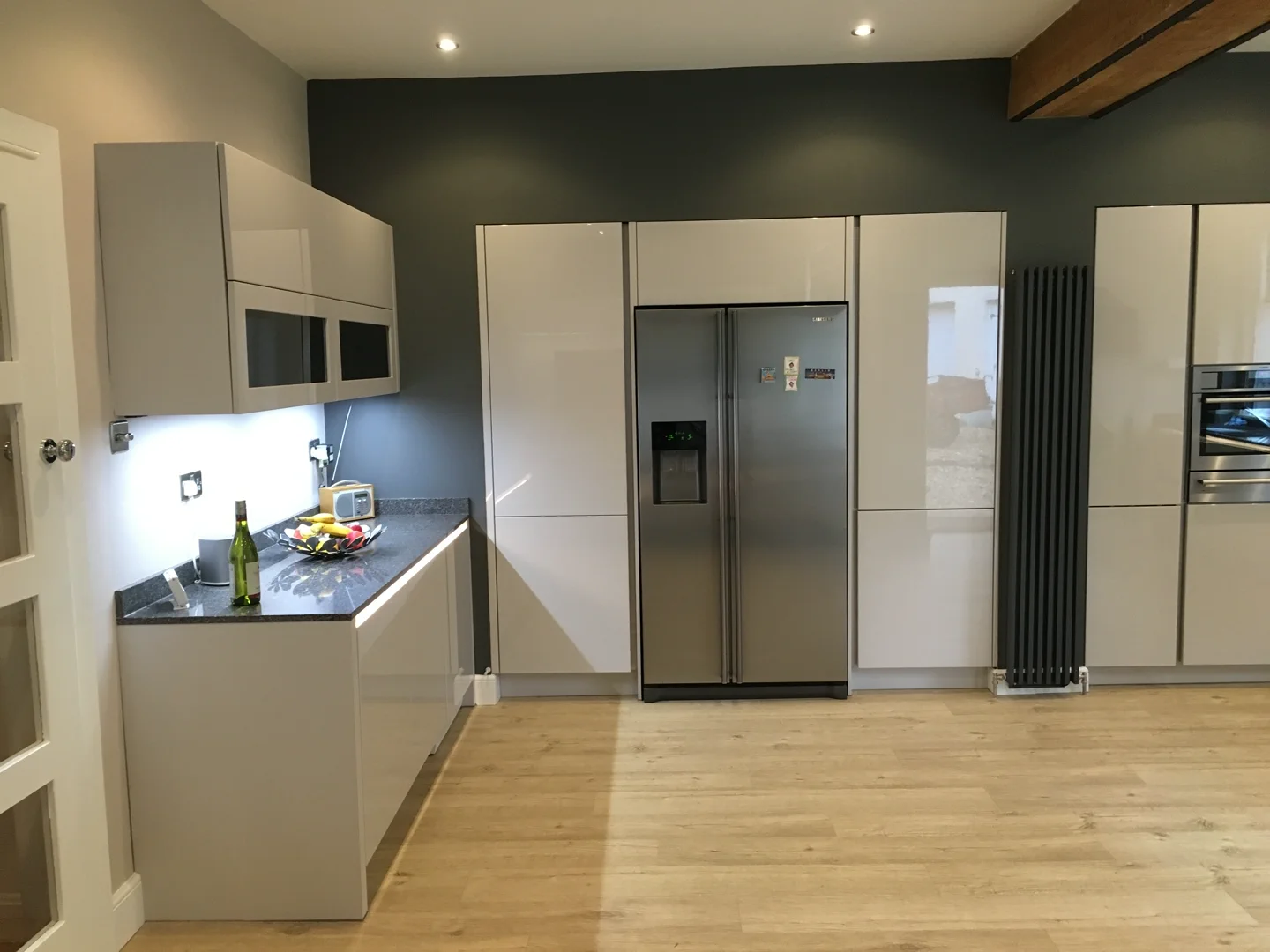 Completed kitchen showing our Vivo Gloass range with white finish