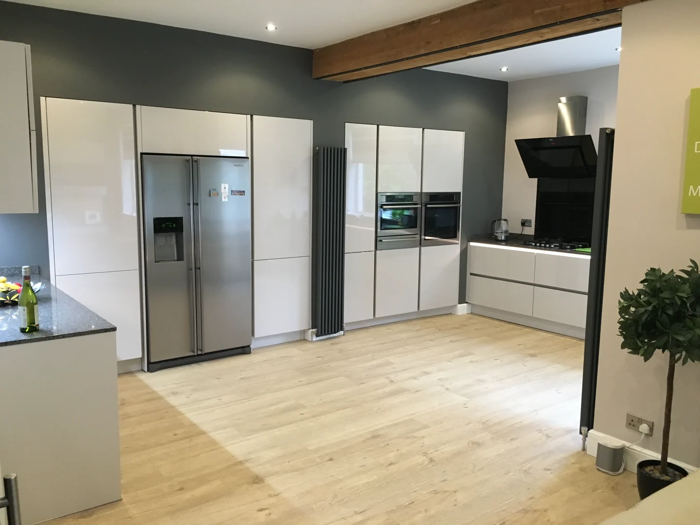 Completed kitchen showing our Vivo Gloass range with white finish