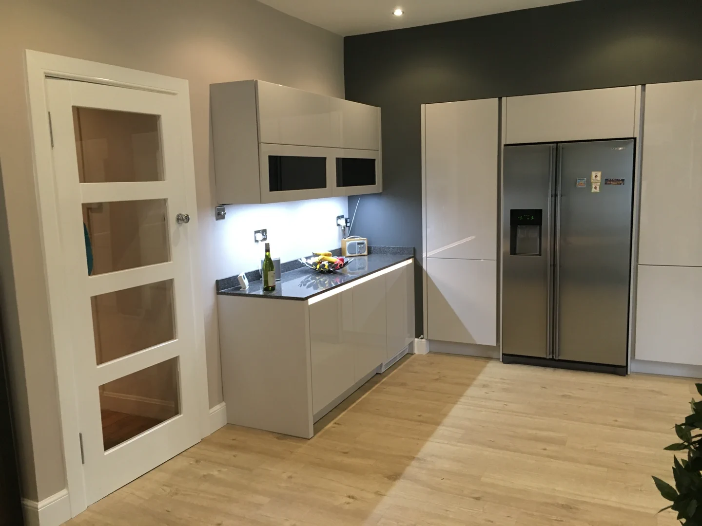 Completed kitchen showing our Vivo Gloass range with white finish